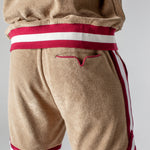 back view of shorts on male model showing signature v pocket and red piping