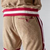 back view of shorts on male model showing signature v pocket and red piping