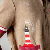 organic cotton terry cloth cabana shirt brings an emrbroidered lighthouse motif to this stylish and playful caban shirt that is a part of a matching set perfect for seaside escape