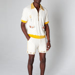 Dine al fresco in a Terry cloth shirt with all the ingredients you need for spaghetti alle vongole, part of a matching set with 'Vongole' Cabana Shorts