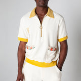 Embroidered fork with pasta. Edge embroidered pockets with classic ingredients. This terry cloth souvenir shirt is the ideal resortwear for your escape.