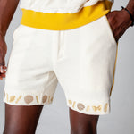 Man puts hand in pocket 