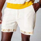 Man puts hand in pocket 