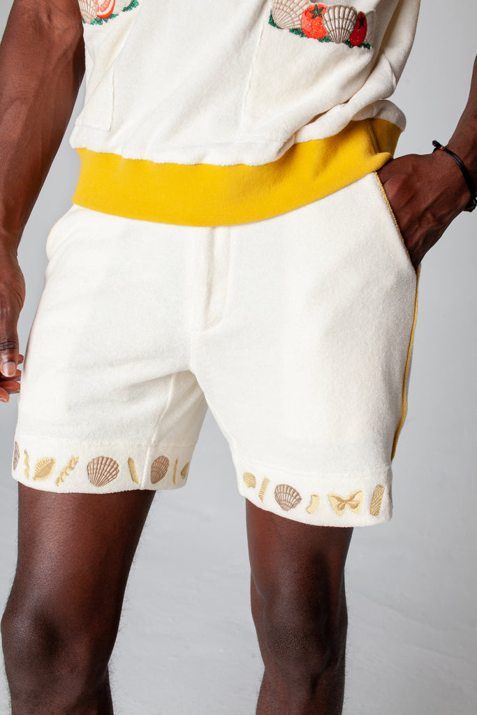 Man puts hand in pocket 