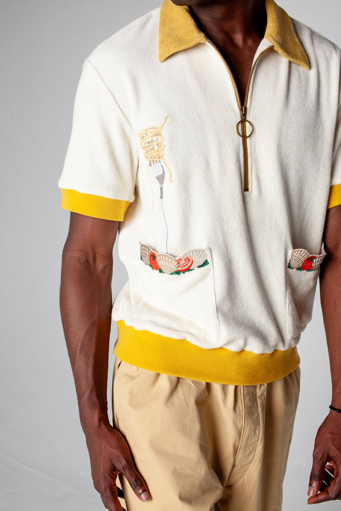 featuring an embroidered fork with pasta and edge embroidered pockets with classic ingredients, this organic cotton terry cloth cabana shirt is sure to have you dining in style
