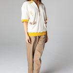 for both men and women, featuring an embroidered fork with pasta and edge embroidered pockets with classic ingredients, this terry cloth souvenir shirt is the ideal resortwear for your escape.