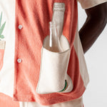 Close up of male model with tequila bottle in the tequila pocket