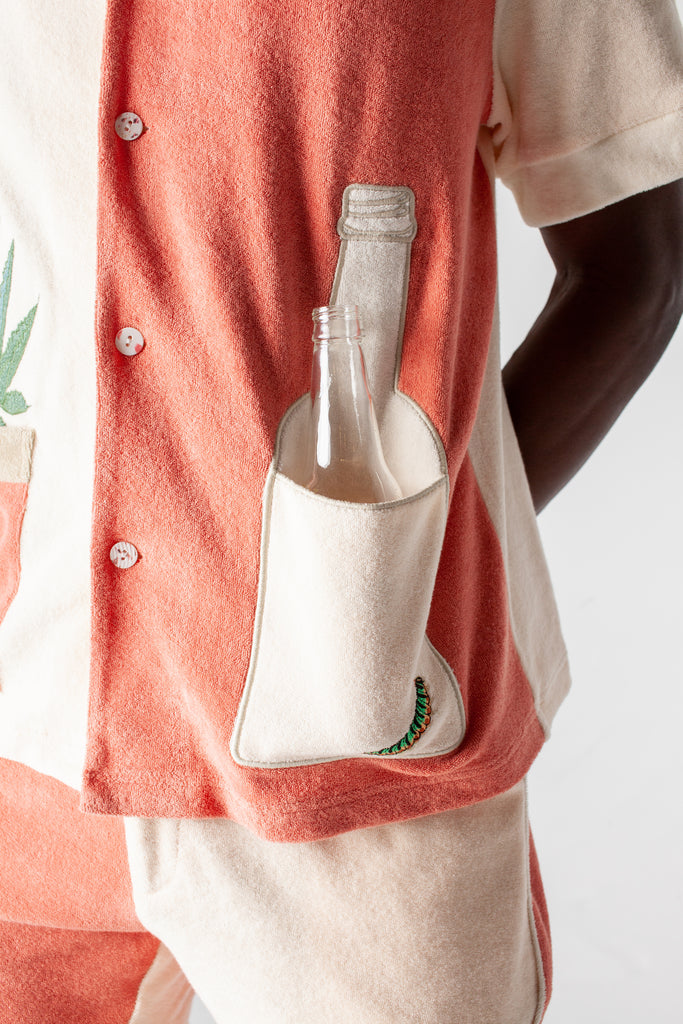 Close up of male model with tequila bottle in the tequila pocket