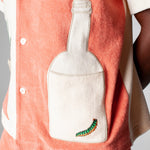 Close up of the right tequila bottle patch that doubles as a pocket