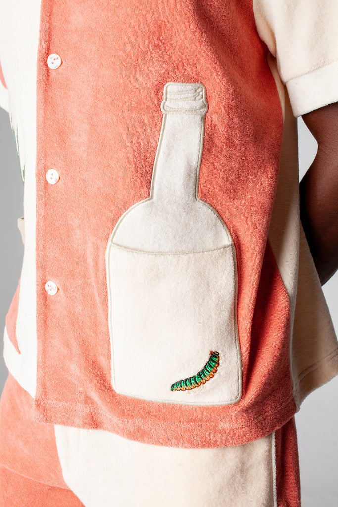 Close up of the right tequila bottle patch that doubles as a pocket