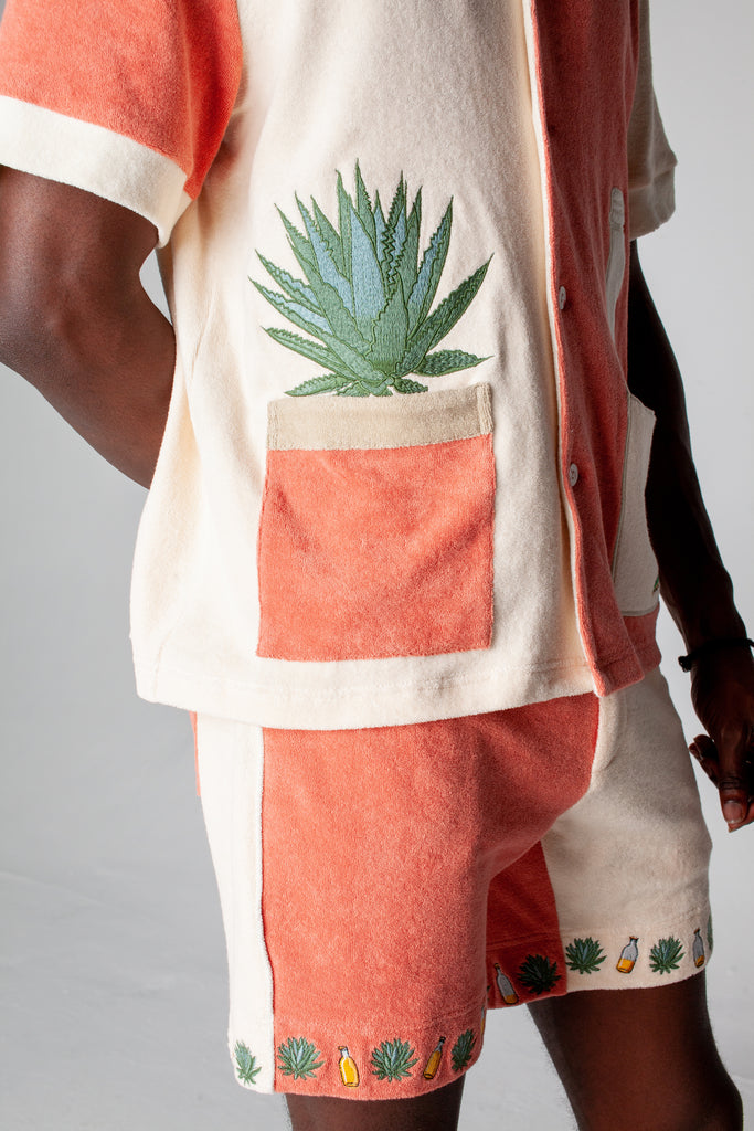 Left side of the Tombolo Gusanito tequila shirt featuring s a fun agave plant embroidered, in which the pot doubles as a pocket