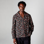 male model in shirt gazing at camera in photo studio