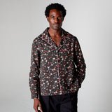 male model in shirt gazing at camera in photo studio