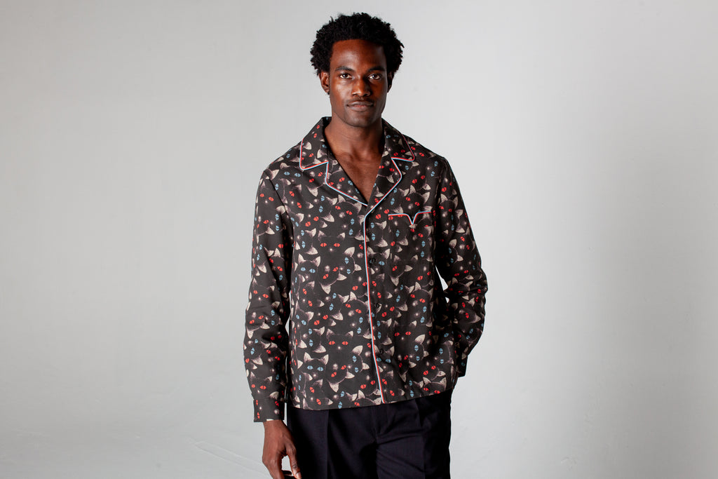 male model in shirt gazing at camera in photo studio